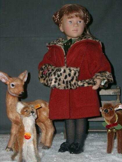 Brauner Puppenmantel mit
Pelzbesatz